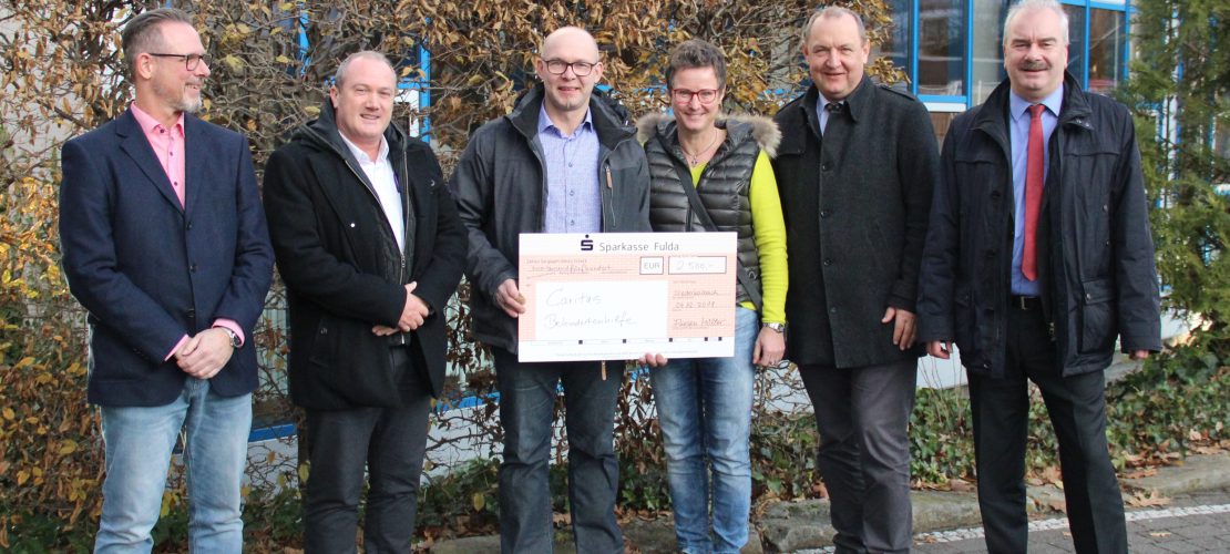 Spendenübergabe Caritas